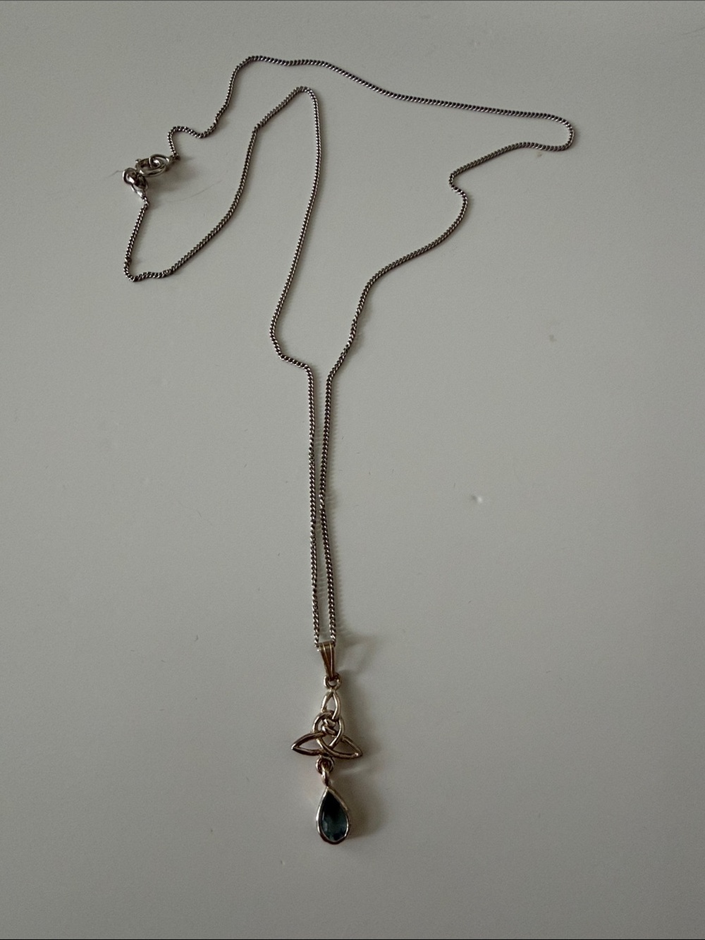 Silver Celtic Knot Pendant Necklace with Teardrop Blue Stone